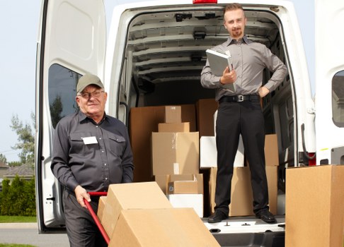 Prepared moving boxes and furniture for a Dulwich home move