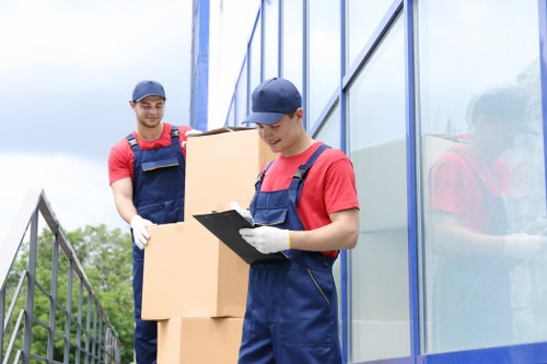 Furniture being loaded into a moving truck in Dulwich