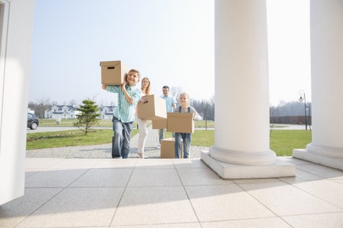 Loading household items for transport with a local van service