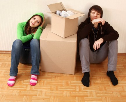 Removal van and packed boxes prepared for a Dulwich house move