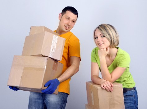 Packed moving boxes and household items ready for transport