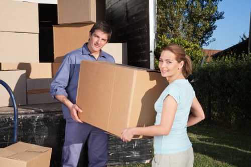 Careful wrapping of fragile items for a move in Dulwich